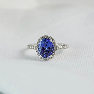 Oval Cut Blue Sapphire Sterling Silver Halo Engagement Ring