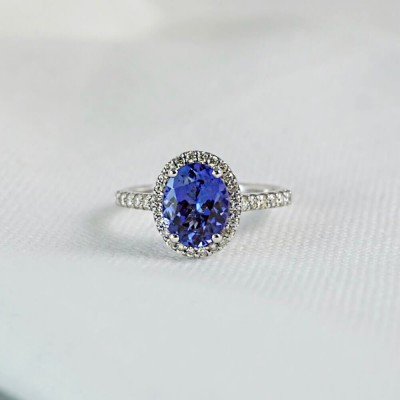 Oval Cut Blue Sapphire Sterling Silver Halo Engagement Ring