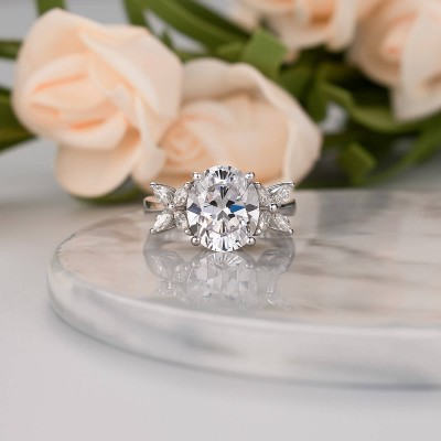 Flower Inspired Oval Cut White Sapphire Sterling Silver Engagement Ring