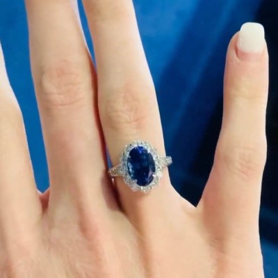 Oval Cut Blue Sapphire Sterling Silver Halo Engagement Ring