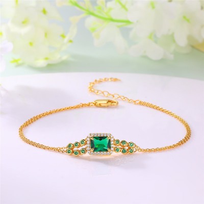 Yellow Gold Radiant Cut Emerald Sterling Silver Halo Bracelet