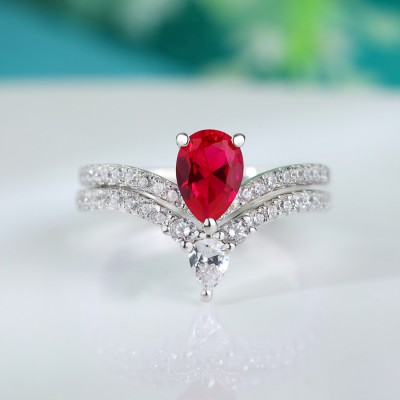 Pear Cut Ruby Sterling Silver Curved Bridal Ring Sets