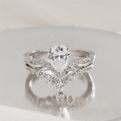 Pear Cut White Sapphire Sterling Silver Curved Bridal Sets