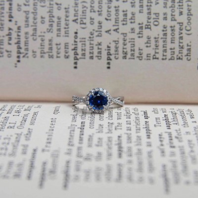 Round Cut Blue Sapphire Sterling Silver Twisted Halo Engagement Ring