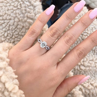 Oval Cut White Sapphire Sterling Silver Twisted Engagement Ring