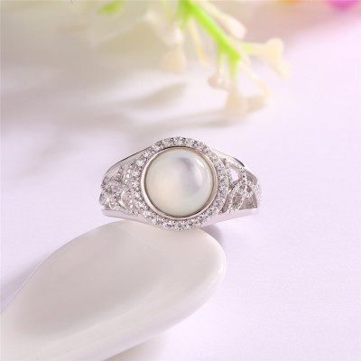Round Mother of Pearl 925 Sterling Silver Halo Engagement Ring