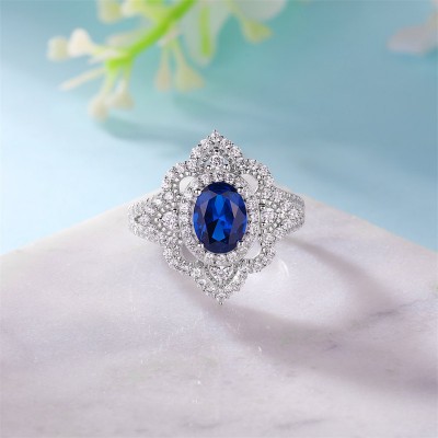 Vintage Oval Cut Blue Sapphire 925 Sterling Silver Halo Engagement Ring