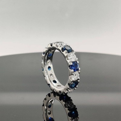 Round Cut Blue & White Sapphire Sterling Silver Eternity Wedding Band