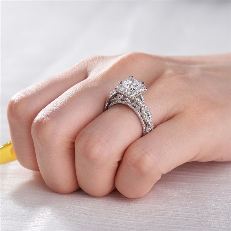 Princess cut white sapphire 925 best sale sterling silver twisted halo engagement ring