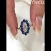 Oval Cut White Sapphire Sterling Silver Flower Halo Engagement Ring - Joancee.com
