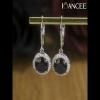 Round Cut Black and White Sapphire 925 Sterling Silver Halo Drop Earrings - Joancee.com
