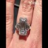 Vintage Baguette Cut Three-Stone Halo Engagement Ring